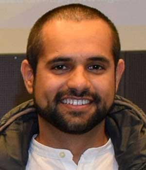 Dr. Tushar Kumeria, a visiting adjunct faculty member, portrayed in a professional portrait against a neutral background