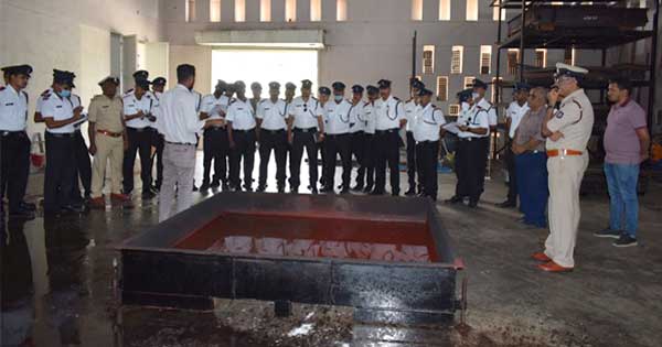 Station Officers' industrial study visit to UL-Jain Fire Lab, featuring fire equipment demos and discussions.
