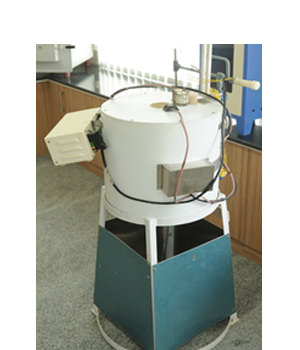 Non Combustibility Apparatus testing specimen for combustibility at FCRC, JAIN (Deemed-to-be University).