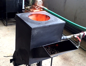 A Pellet Stove in operation at FCRC, JAIN (Deemed-to-be University)